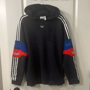 Adidas Trefoil Hoodie Sweatshirt 
Men's Black Hoodie with Blue and Red Accents